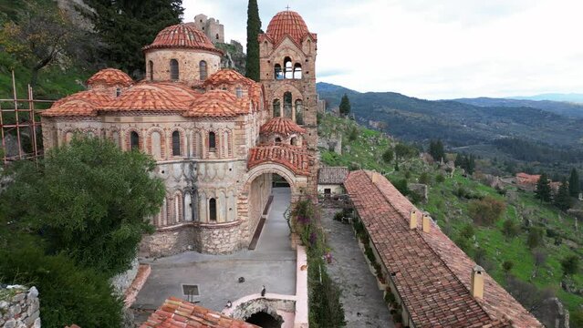 Mystras or Mistras, also known in the Chronicle of the Morea as Myzethras or Myzithras, is a fortified town and a former municipality in Laconia, Peloponnese, Greece. Ruines drone aerial view 