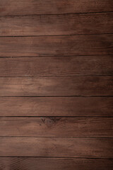 Obraz na płótnie Canvas Vintage brown wood background texture with knots and nail holes. Old painted wood wall. Brown abstract background. Vintage wooden dark horizontal boards. Front view with copy space