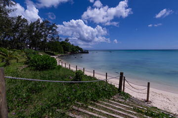 Dramatic clouds on a beautiful beach in Mauritius