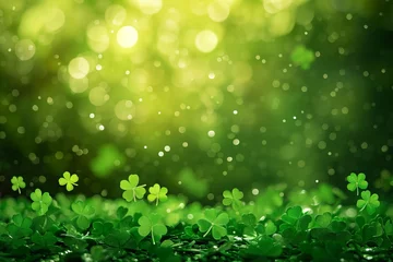Foto op Canvas Abstract green blurred background with clovers and round bokeh for st patrick's day celebration © Sunny