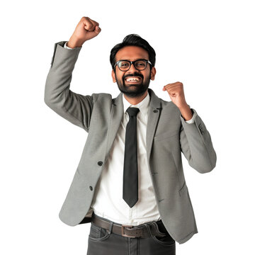 Upper body shot of an Indian business man cheering with joy raising his fist in the air, celebrating a success. Happy office winner. Transparent background.