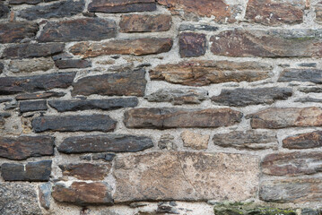 Texture of a wall made of old stones.