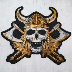 Embroidered patch with Viking skull in horned helmet with axes. Asatru paganism Nordic beliefs. Odin, Thor, Loki, Valhalla. Accessory for bikers, motorcyclists, rockers, metalheads, punks. Rock'n'roll - obrazy, fototapety, plakaty