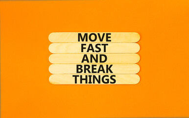 Move fast and break things symbol. Concept words Move fast and break things on wooden stick....