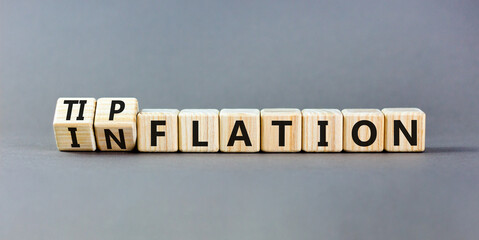 Inflation or tipflation symbol. Concept words Inflation Tipflation on beautiful wooden blocks....