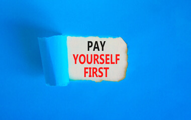 Pay yourself first symbol. Concept words Pay yourself first on beautiful white paper. Beautiful blue paper background. Business and pay yourself first concept. Copy space.