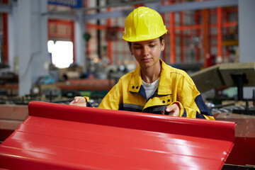 worker or technician holding and checking quality metal sheet in the factory - obrazy, fototapety, plakaty
