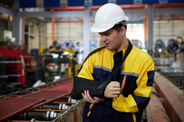 worker or engineer wearing bandages splint, pain in elbow and ache in arm from hard work in the...