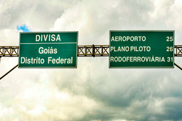 Signs on the East Division (border) between the Federal District and Goias State on BR-040 Highway...