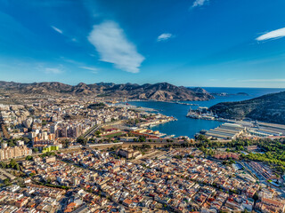Aerial view of Cartagena port city in Spain surrounded by bastions and fortifications, medieval...