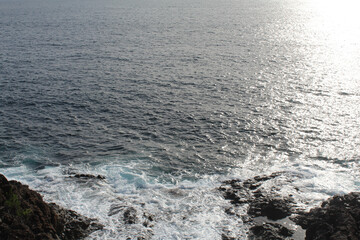 blue ocean waves on the rocks