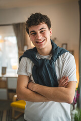 Fototapeta na wymiar Portrait of teenage boy caucasian teen male young man stand at home
