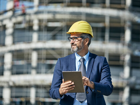 businessman construction site business architect building engineer builder tablet helmet architecture blueprint worker man contractor adult engineering industry