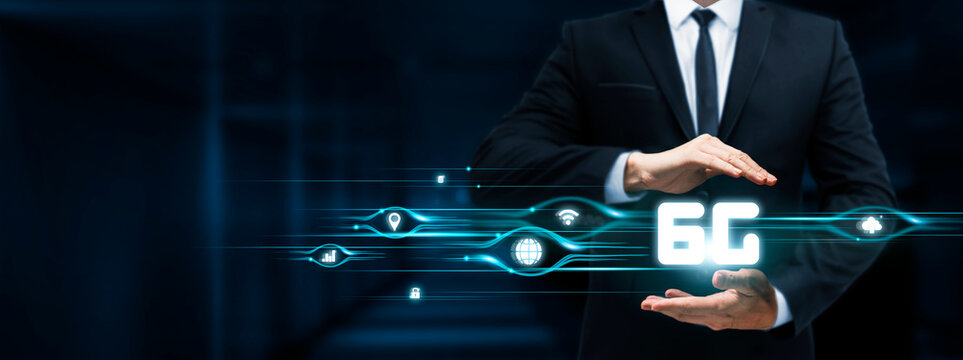 6G Technology, Businessman Holding 6G Icon, Futuristic Innovations, Network Evolution on Dark Background.