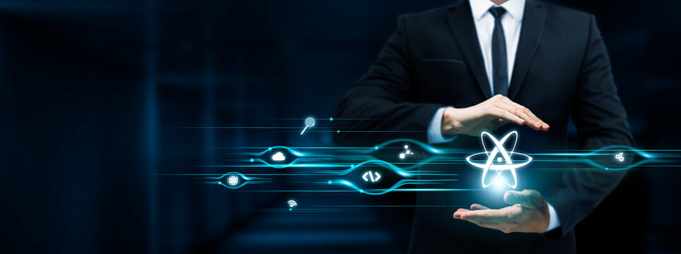 Quantum Computing, Businessman Holding Quantum Computing icon, Technological Advancement, Quantum Algorithms, Innovation on Dark Background.