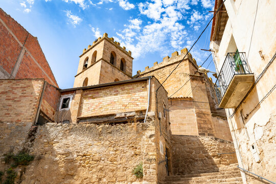 a street with a view to the church in Fabara - Favara, province of Zaragoza, Aragon, Spain