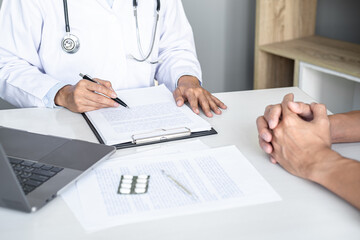 Medicine and health care concept, Professor Doctor presenting report of diagnosis and recommend something a method with patient treatment, after results about the problem illness of patient
