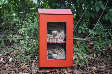 Firebox in the woods, with fire extinguished.