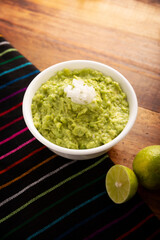 Guacamole. Avocado dip sauce, one of its many ways of consuming it is spread on tortilla chips also called Nachos. Mexican easy homemade sauce recipe very popular.
