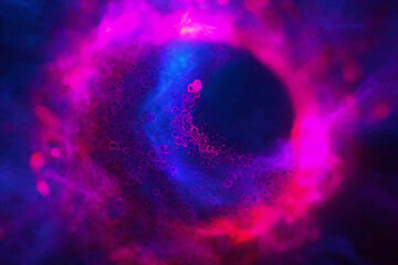 Purple and pink futuristic galaxy space particles in bright roun