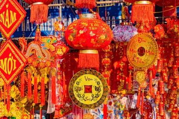Fototapeten The fair before the Lunar New Year. The Eastern New Year according to the lunar calendar. Sale of attributes and jewelry in Nha Trang in Vietnam. © MASTERVIDEOSHAR