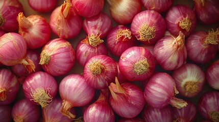 Pile of fresh red onion or shallot. Top view.