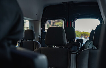 Interior with seats inside the minivan car.