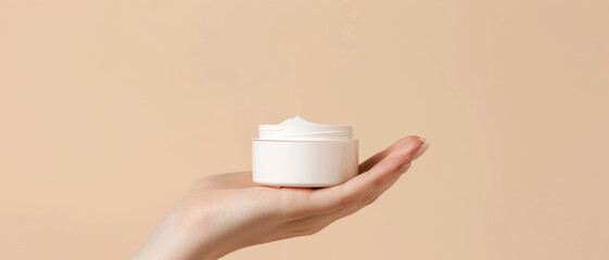 Fototapeta na wymiar Simplicity in skincare: an open jar of cream in a nurturing hand, against a minimalist backdrop