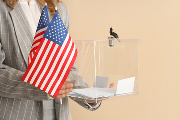 Woman holding ballot box and USA flags on beige background. Election concept