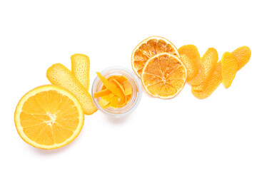 Fresh and dried orange and peel on white background
