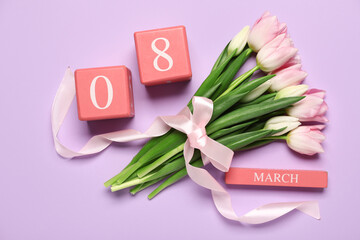 Tulip flowers with ribbon and calendar on purple background. International Women's Day celebration