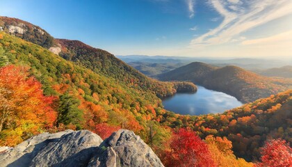 autumn mountain landscape with lake from a bird s eye view on sunny day mountains covered with...