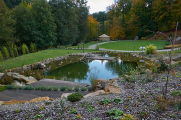 Fototapeta na wymiar Luhacovice, Czech Republic - October 28, 2023 - The Augustinian House garden on a sunny autumn afternoon
