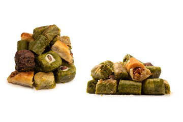 Turkish pistachio baklava isolated on a white background. A variety of turkish sweet baklava.