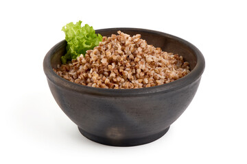Buckwheat in a pot, isolated on white background.