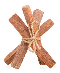 Sandalwood sticks tied with rope isolated on a white background