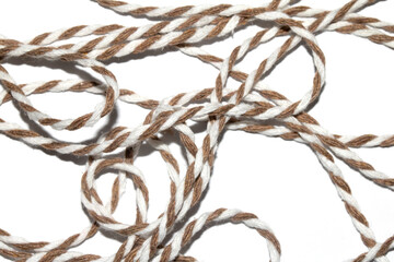 Wrapping Paper Stripy String Rope Close Up on White Background