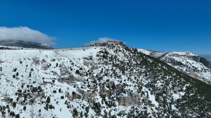 Aerial drone photo of snowed mountain of Parnitha as seen at winter the highest in Attica...