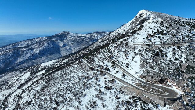 Aerial drone photo of snowed mountain of Parnitha as seen at winter the highest in Attica prefecture, Athens, Greece