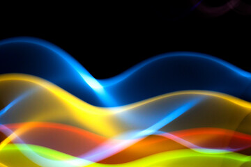 Neon Wavy Rainbow Lines on Black Background