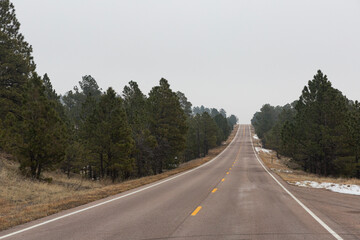 Open road in Eastern Colorado, approaching the Rockies.  December.  