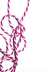 Wrapping Paper Stripy String Rope Close Up on White Background