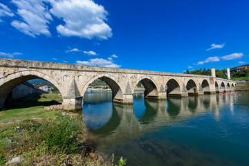 Visegrad, Bosnia and Herzegovina - August 13, 2023: Famous bridge on the Drina in Visegrad, Bosnia...