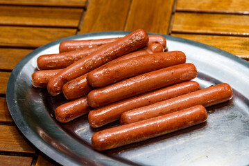 Close up of grilled hotdogs