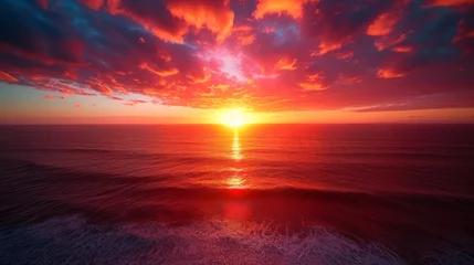 Fotobehang Nature's evening masterpiece, a serene sunset over the ocean with fiery red hues illuminating the sky, creating a peaceful afterglow as the heat of the day gives way to the calm of dusk © ChaoticMind