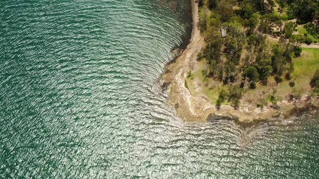 Lake Macquarie waterfront at Murrays beach bays and capes in aerial fly 4k.
