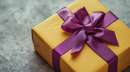 A visually striking image featuring a beautifully crafted yellow gift box adorned with a vibrant purple ribbon, inspired by the precisionist art movement. The texture-rich surfaces lend an a