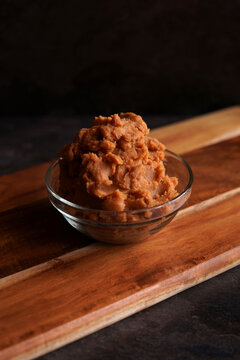 Healthy probiotic Japanese style miso against a dark background.