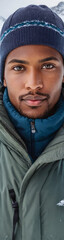Obraz premium Winter Wonderland: BIPOC Person Outdoors in Snowy Mountains Wearing Stylish Winter Clothing - Diverse Outdoor Winter Scenery, Snowy Landscape with Mountain Peaks, Cold Weather Outdoor Fashion