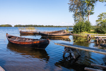 old wooden boats on the shore of Lake Onega. Karelia. beautiful landscape